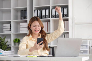 pngtree successful asian teen celebrates with laptop girl smiling successful photo image 51743930